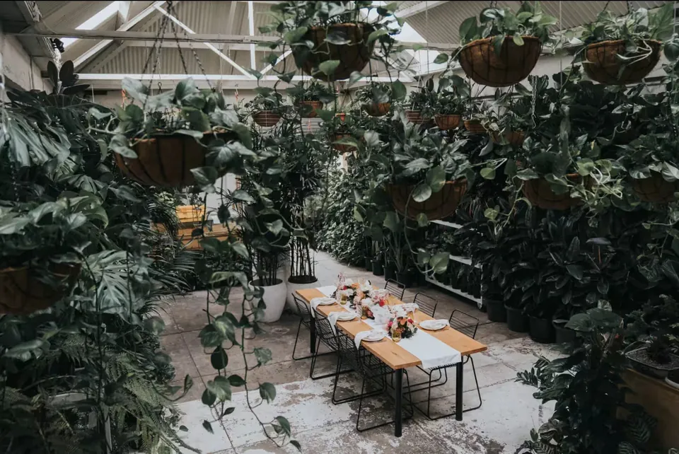 Garden reception tables at Botanicah Sanctuary Prahran, a Just Naples wedding catering partner venue