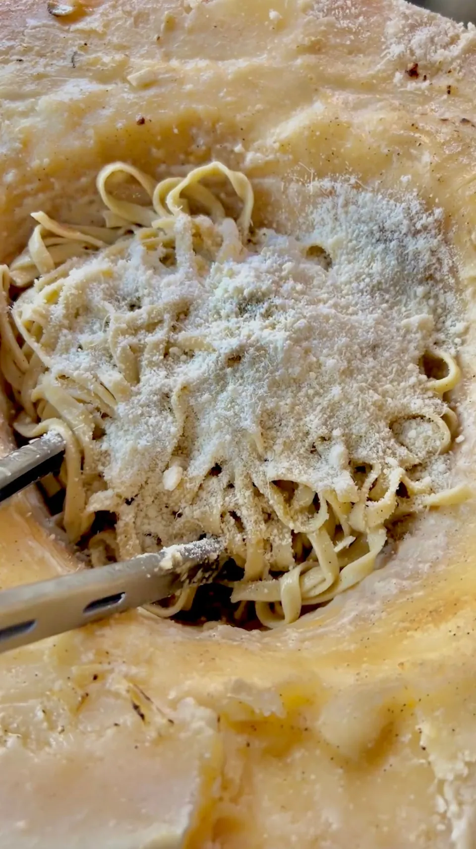 Pasta tossed in a Parmigiano cheese wheel, Just Naples pizza catering Melbourne